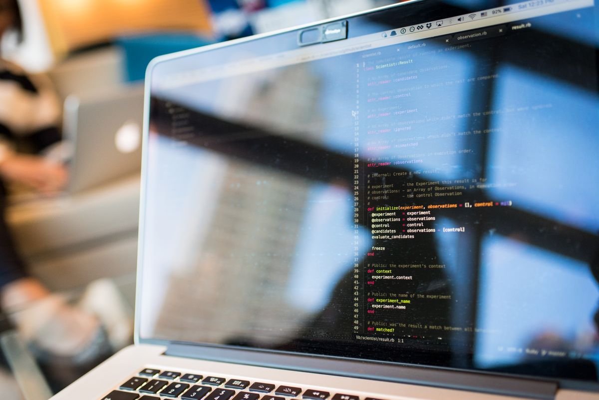 Laptop displaying application source code