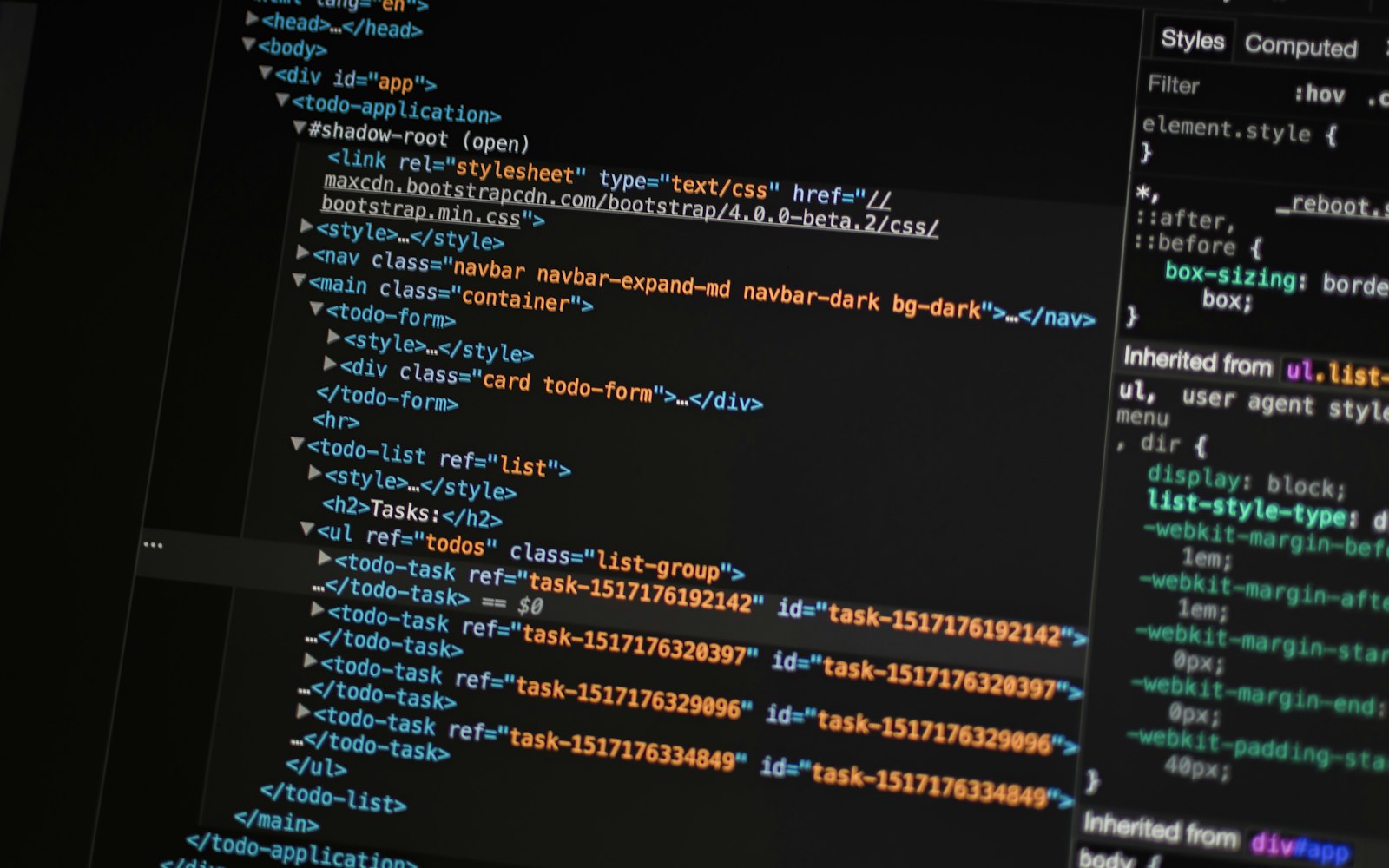 Developer inspecting application code and browser developer tools while reviewing an AI feature