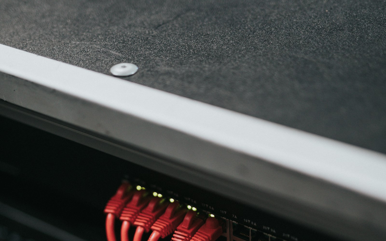 Network switch and cabling representing edge delivery infrastructure and origin connectivity